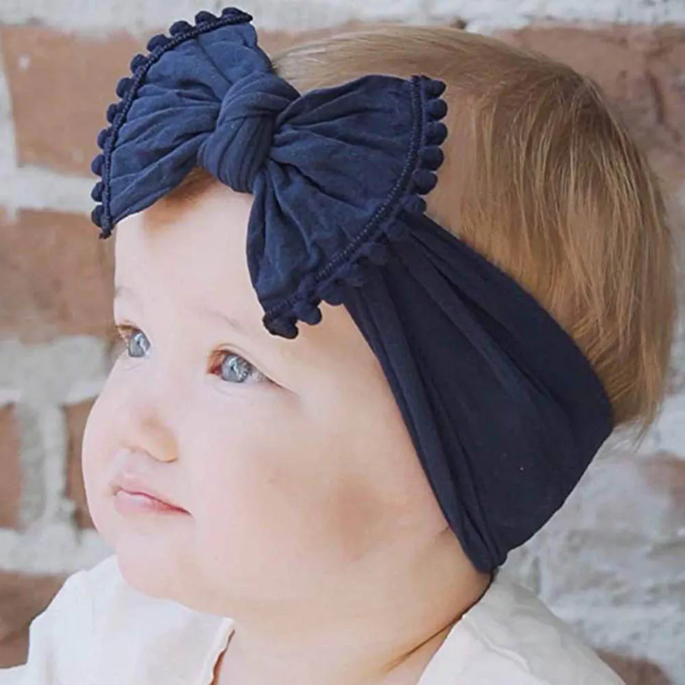 Diadema con lazo de nailon liso, diadema con pompón para niños y niñas, turbante de nailon para bebé, accesorios para el cabello para niños