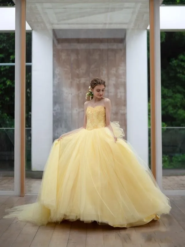 Big yellow prom best sale dresses
