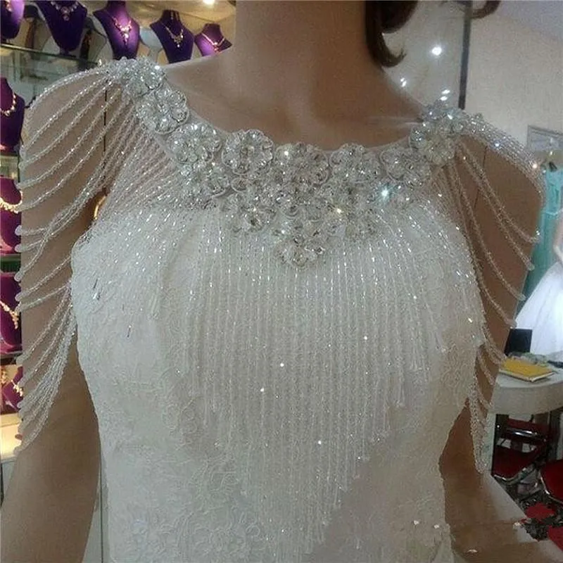 Avvolge Giubbotti 2021 Vendita superiore di lusso strass di cristallo Bling da sposa in pizzo bianco scialle giacca Bolero Wrap