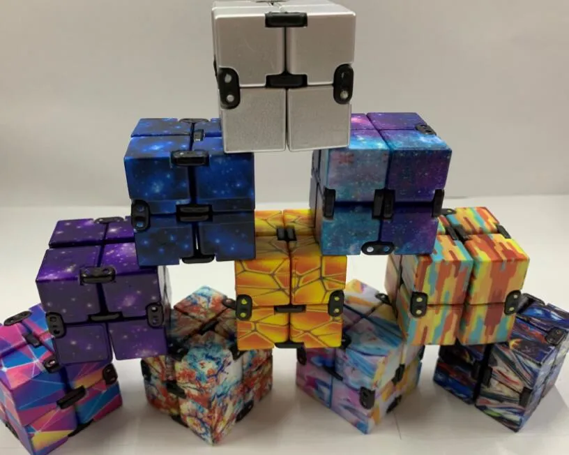 Alta calidad Infinity Magic Cube Creative Galaxy Fitget juguetes Antiestrés Oficina Flip Cubic Puzzle Mini bloques Descompresión Juguete DHL 3-7 días de entrega CY15