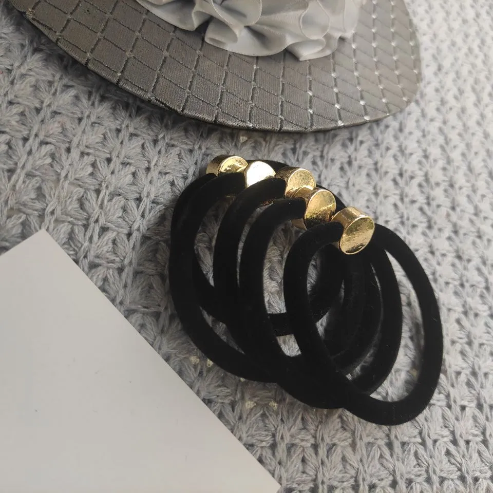 円形のCの金属の装飾とファッションの髪のつながり黒の良質の高弾性の髪ロープベレットアクセサリー