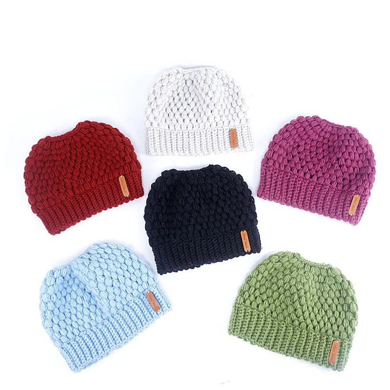 Mode hiver respirabilité bonnets queue de cheval pas de haut tricot chapeau pour femmes chaud oreille bonnet de protection 7 couleurs mélangées en gros