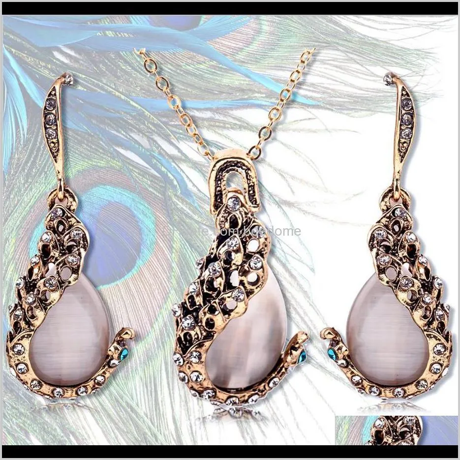 jewelry sets peafowl white crystal setting wate-drop stone pendant gold color plated metal chain earring necklace