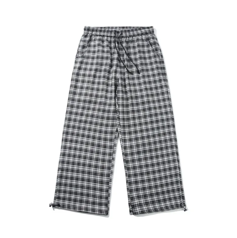 Pantalon à carreaux de damier Pantalon de cordon décontracté des hommes et des femmes Couple couple à jambe droite jambe de jambe de gros design de hommes