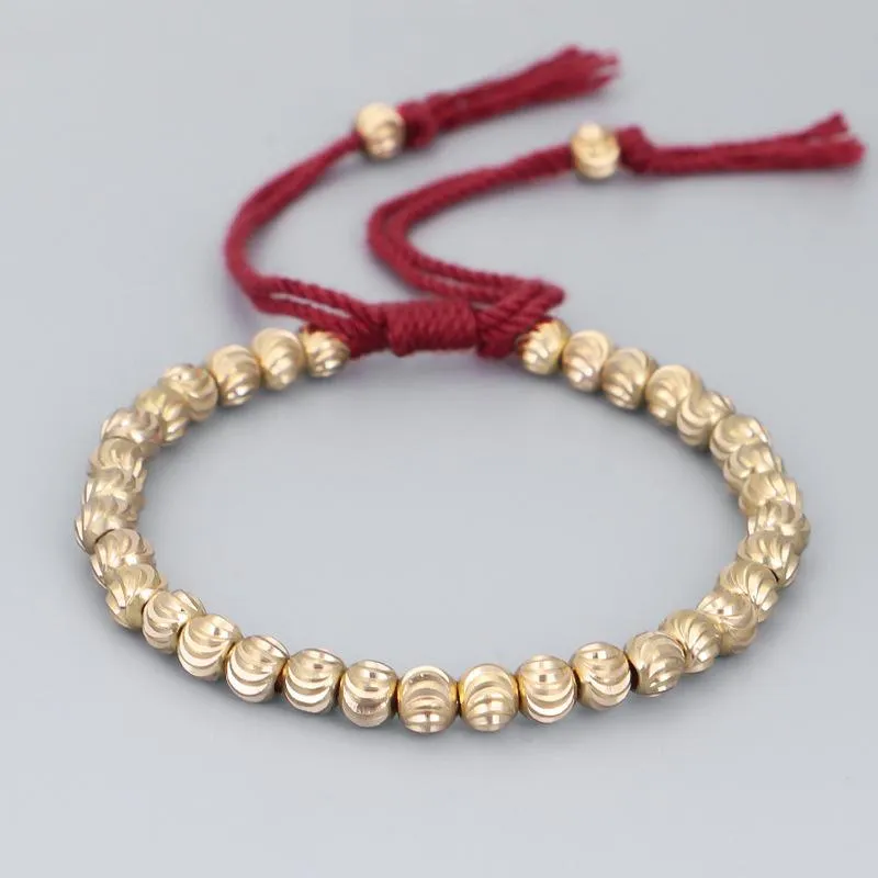 Braccialetti con ciondoli Buddista tibetano regolabile Filo di cotone intrecciato a mano Perline di rame Bracciale con nodi fortunati Gioielli da donna in ottone