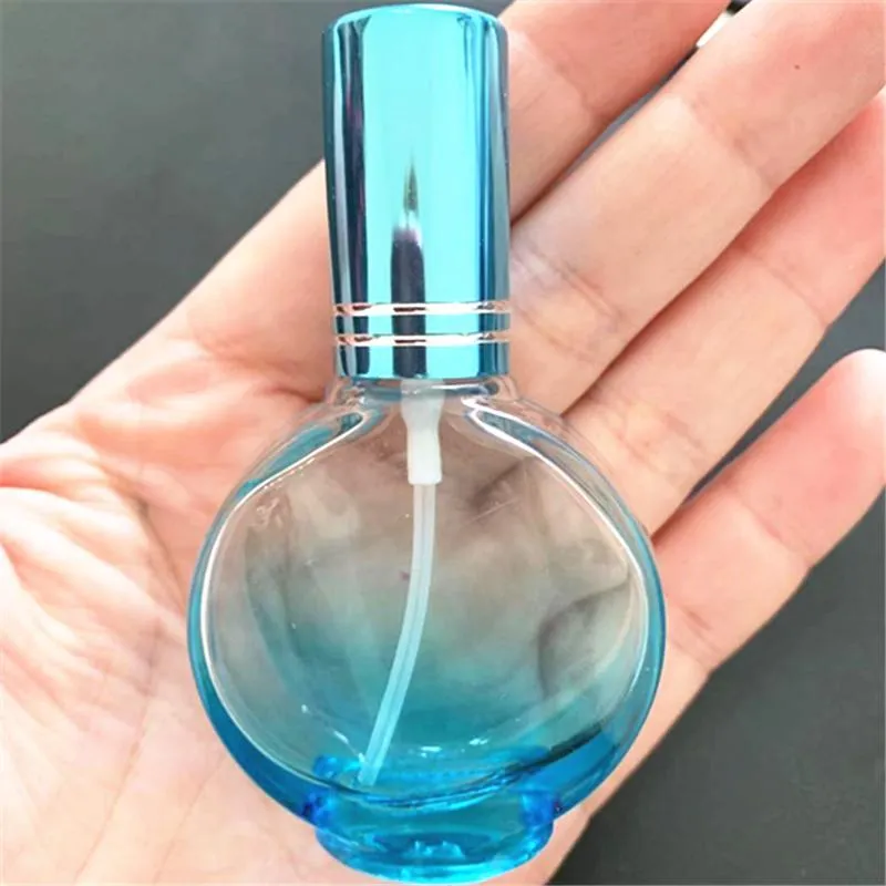 Commercio all'ingrosso Bottiglia di profumo in vetro da 15 ml Nebulizzazione fine Pressa portatile Piccola rotonda colorata