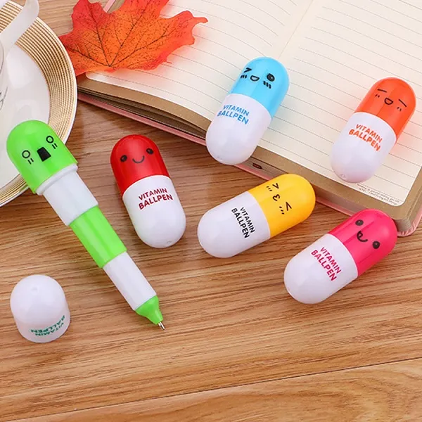 Cute pill pen cartoon expression telescopic Kindergarten small gift capsule creative stationery ball wholesale