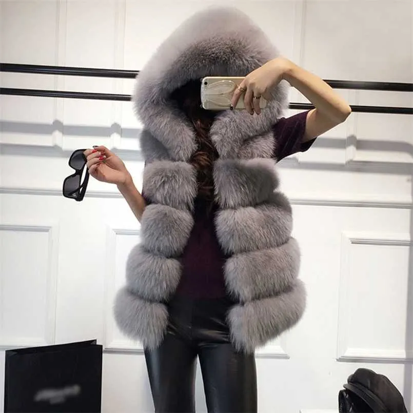 ノースリーブのフェイクの毛皮ベスト冬のカジュアルな上着女性の固体偽の偽の毛皮のフード付きオーバーコート