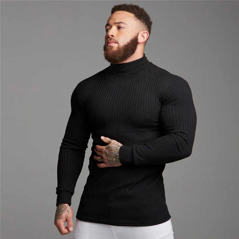Hombres De Punto Superior De Manga Larga Cuello Alto Color Puro Ahueca Hacia Fuera El Suéter