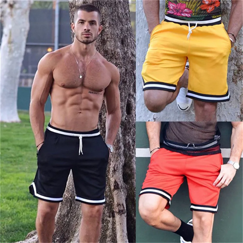 Diseñador para hombre pantalones cortos de verano pantalones de color sólido a rayas elástica wais ocasional pantalones cortos sueltos casuales moda para hombre pantalones