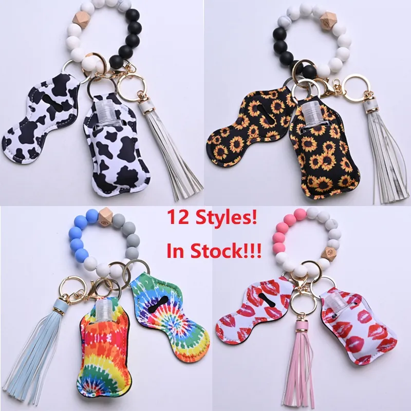 12 cores 4 pçs / conjunto Keychain de moda com mão sanitizante garrafa e bolsa grânulos pulseira pulseira titular chaveiros para mulher homens segurança keyring pulseira