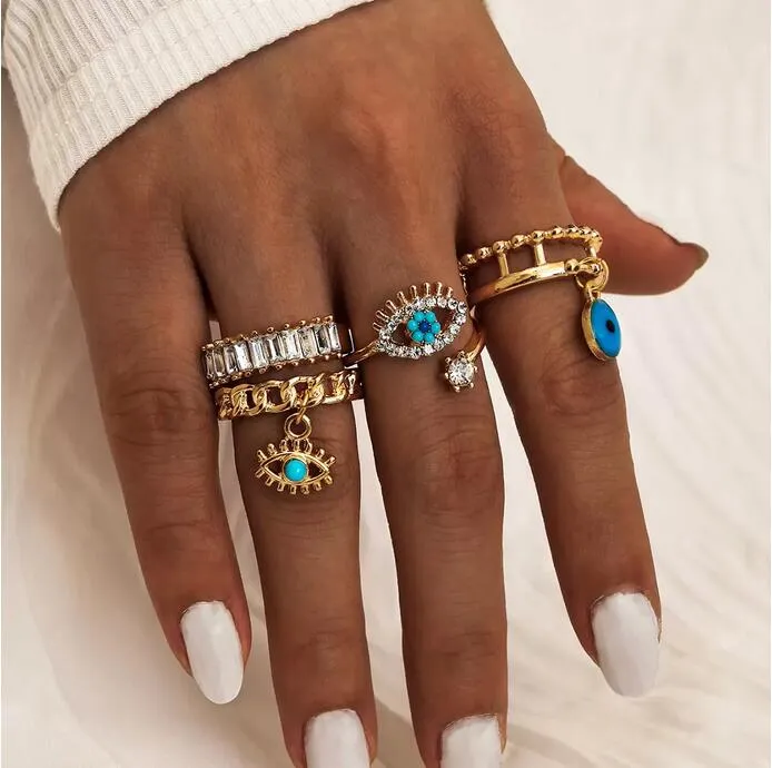 4pcs / set moda turchese diamante malvagio occhio anelli dito con pietre laterali donne ragazze anello gioielli set