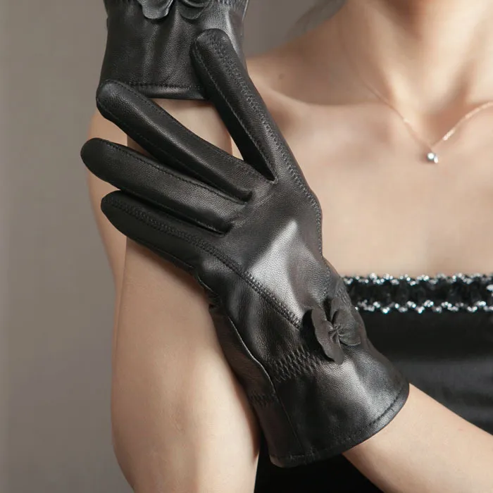real fur Leather gloves winter women`s white black sheepskin warm thickening plus velvetBow Korean mitten for women