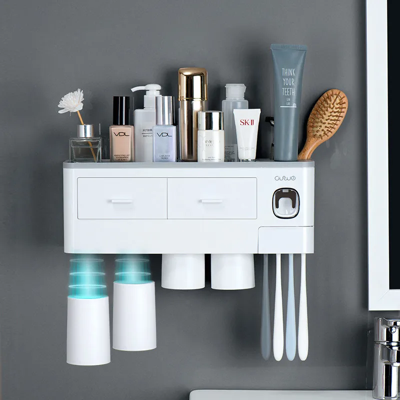 Porte-brosse à dents magnétique Distributeur automatique de dentifrice avec tasse Support de rangement pour articles de toilette à fixation murale Ensemble d'accessoires de salle de bain 210322
