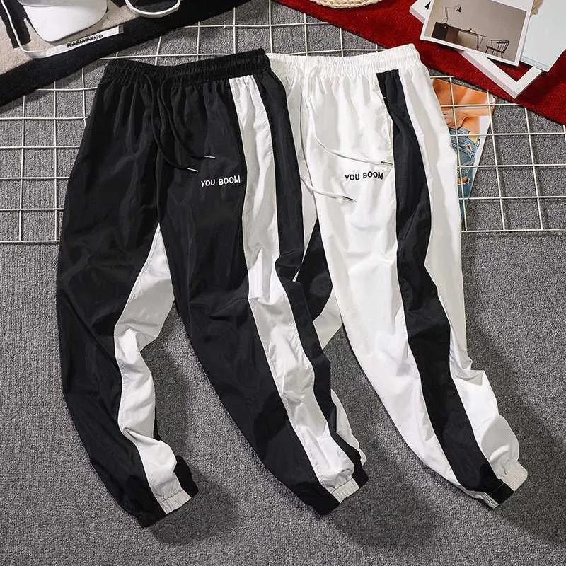 Męskie Legginsy Spodnie Deskorolka Deskorolka Spodnie dresowe Mężczyźni Fall Moda Sznurek Sport Streetwear Hip Hop Harem Pant Spodnie Y0927