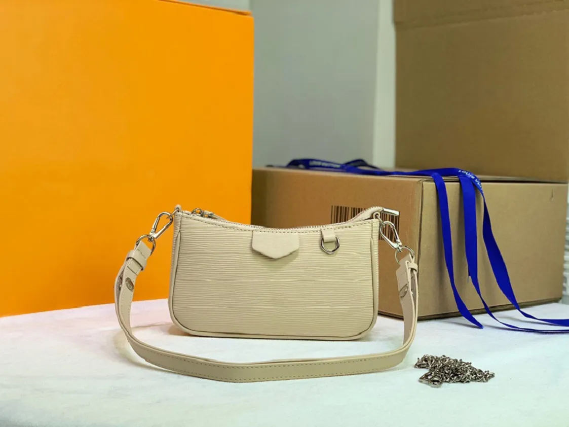 Högkvalitativ mode Luxurys axelväska Onthego Medium Tote Kvinnor Designers Handväskor vid poolen Monograms Embossing Messenger Bags 3811