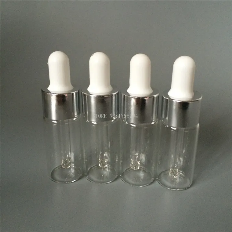 10 pçs / lote 10ml / cc Glass Glass Garrafa, garrafa transparente com ouro e tampa de prata óleos essenciais vazios para perfume