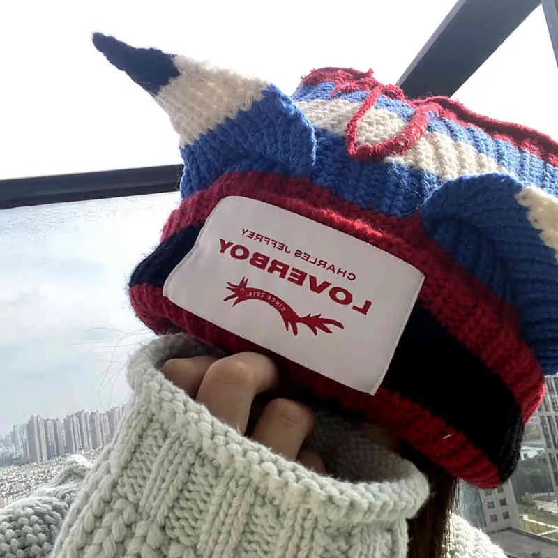 Le même Loverboy de Yang Chaochao nouveau rouge et bleu rayé cochon chat oreille laine chaud tricot froid hat221A