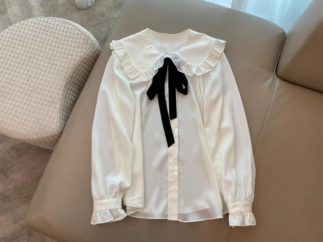 Kvinnors Blusar T-shirts 2021 Kvinnor Mode Långärmad Sexig Silk Blended Doll Collar Black Ribbon Polka-Dot Shirt 0913