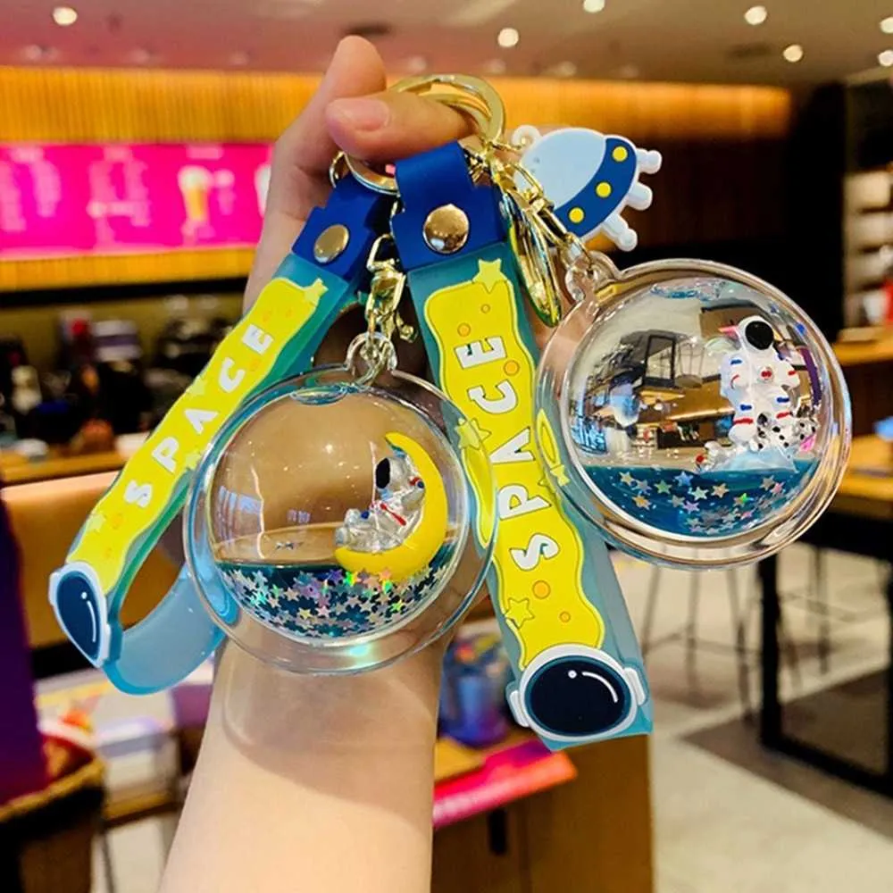 Creative Creative Star Star Astronauta Floating Keychain Casal Carro Keychain Chaveiro Mochila Pequeno Pingente Arquivos Requintados G1019