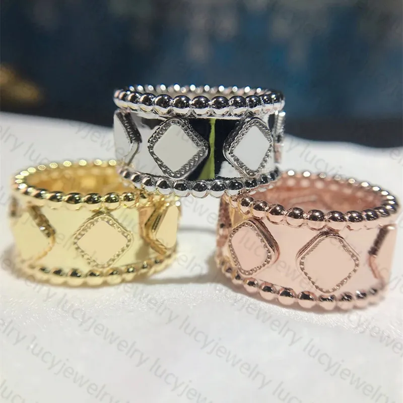 Diseñador Ring Clover Stones Anillos Amantes de la boda para el hombre 2 estilo 15 Color Top Quality304H
