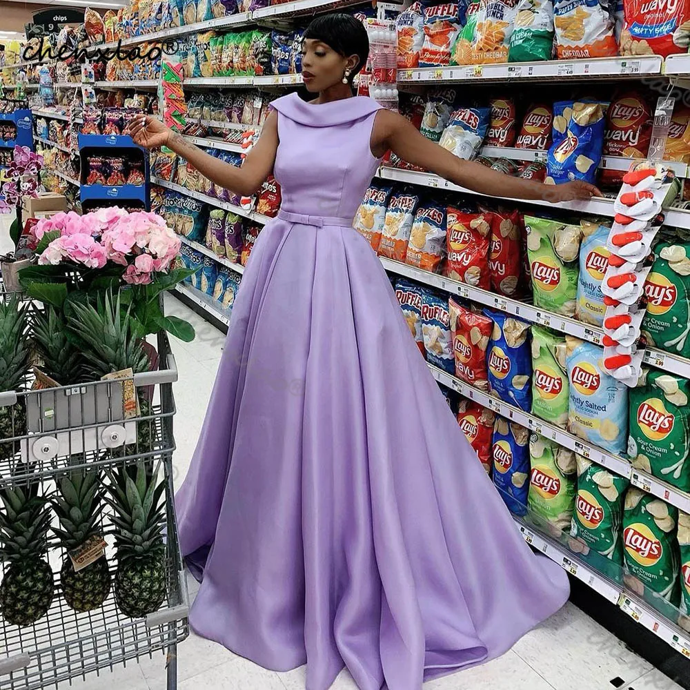 Lavender V-Cut Backless bridesmaid dress with Pleated Satin A-Line Prom Gown, Bow Tie Belt, and Maxi Length for Wedding Guests Lavender V-Cut Backless bridesmaid dress with Pleated Satin A-Line Prom Gown, Bow Tie Belt, and Maxi Length for Wedding Guests