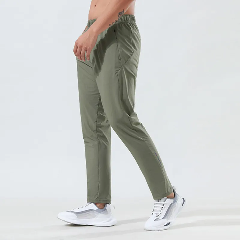 Męskie dresy Projektant sportowy Odzież Spodnie do fitnessu Bieganie Oddychające spodnie szybkoschnące Rozciągliwe Solidne spodnie dresowe do biegania