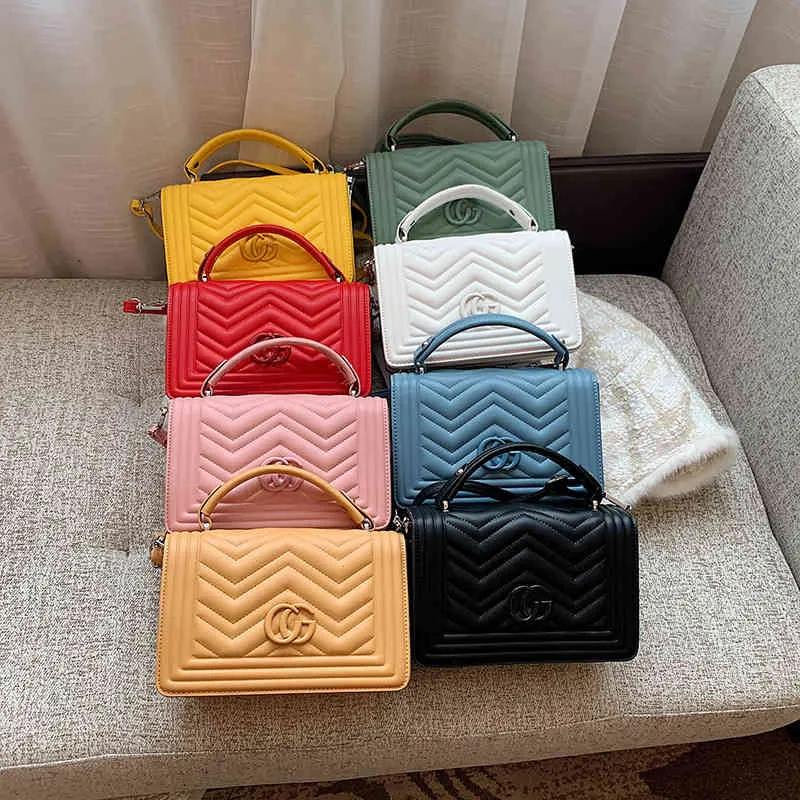 50% OFF designer bags women`s bag new simple fashion candy embossed hand-held Single Shoulder Messenger Bags