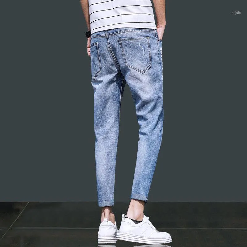 Heren jeans groothandel 2021 gescheurde enkel lengte kleine voeten Koreaanse stijl trend jeugd stretch casual potlood broek mannen