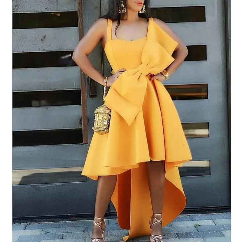 Yellow Flare Pleated Yellow Party Wear Dress With Bow Tie For