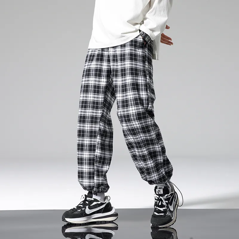 Jesienne spodnie do kraty mężczyzn moda luźne hip hop casual spodnie koreańskie męskie spodnie haremowe wszystkie mecze komfortowe biegacze streningowe