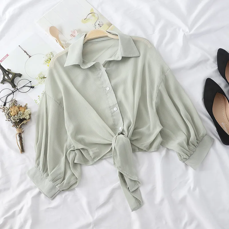 Top donna Liu Jo in viscosa con righe, scollo a V e dettaglio catena