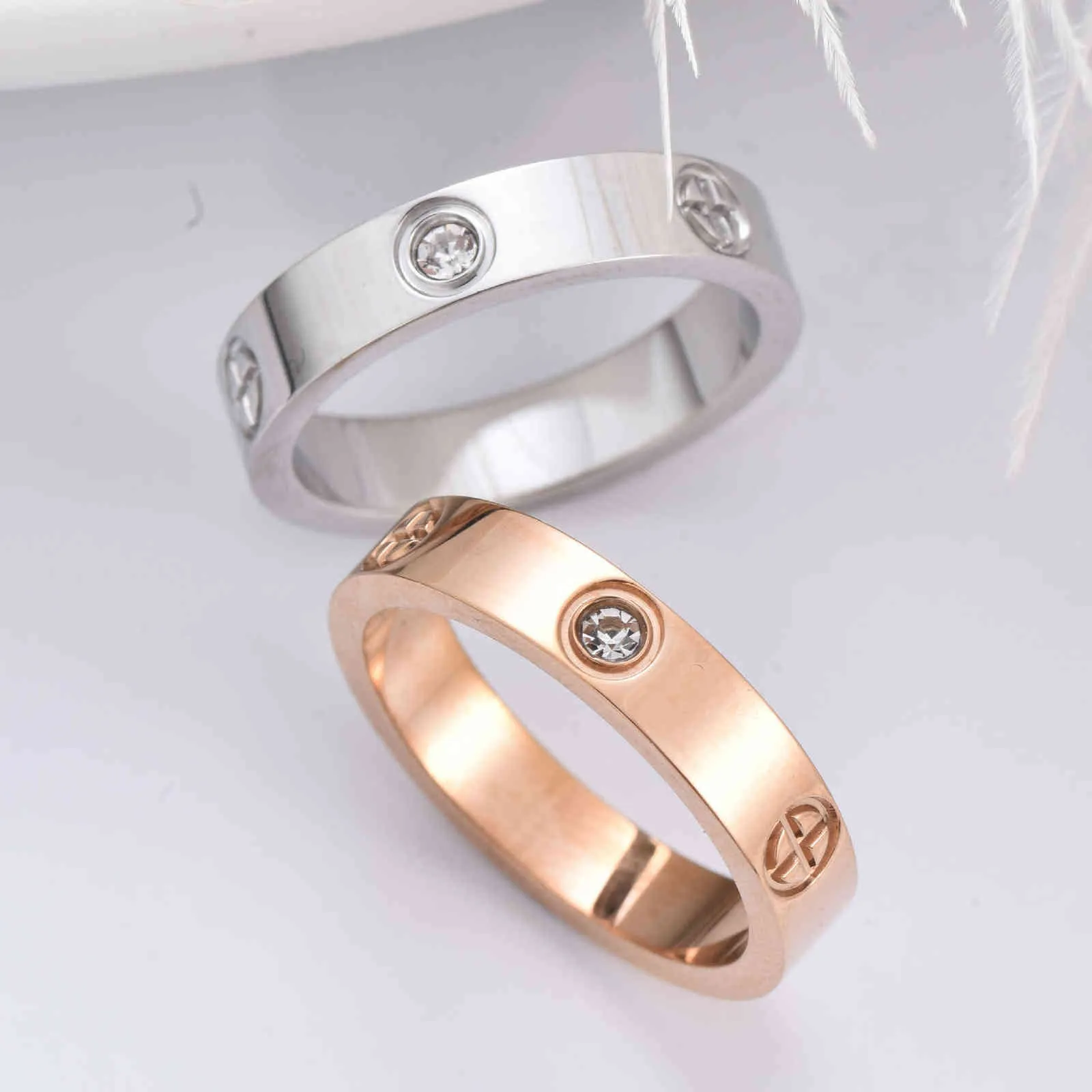2021 New Cross Zircon Crystal Titanium Steel Rose Gold Fashion Ring Fedi nuziali per feste femminili per gioielli da donna Intera vendita G1125