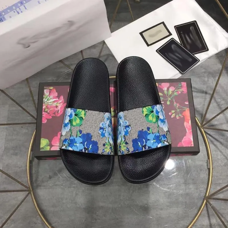 Designer tofflor män kvinnor sandaler blommor tofflor gummi glider blommig platt flip flops sommarstrand utomhus sandal låda