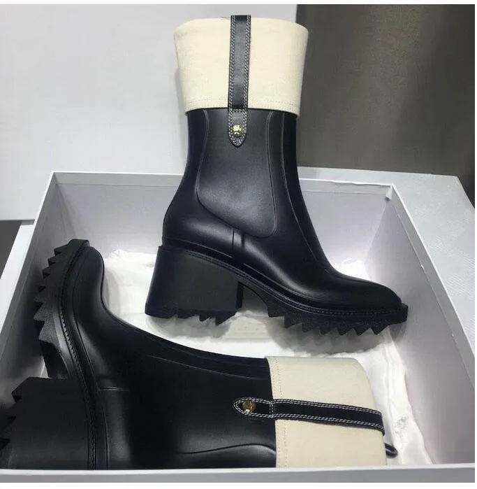 女性のベティブーツrainbootsハイヒールの防水デザイナーブートPVCゴム雨水靴膝の高新デザイン