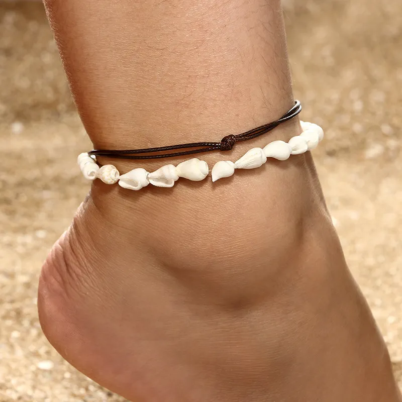 Bracelets de cheville bohème en coquillage pour femmes, en cuir tissé à la main, bijoux de pied en coquillage naturel, plage d'été, pieds nus, cheville sur jambe