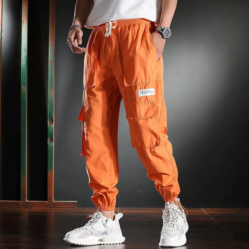 Mensbyxor baggy orange last män sommar hiphopkläder bomull multi-fickiga dragkammare byxor