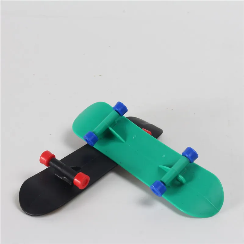Mini jeu de skateboard portable doigt pour enfants ensemble jouet avec  pantalon
