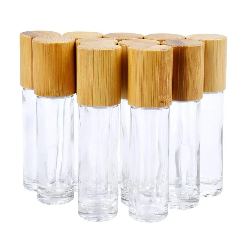 Rollo de vidrio transparente de rollo de aceite esencial de 5 ml 10 ml en botella de perfume con tapa de bambú natural Bola de rodillo de acero inoxidable