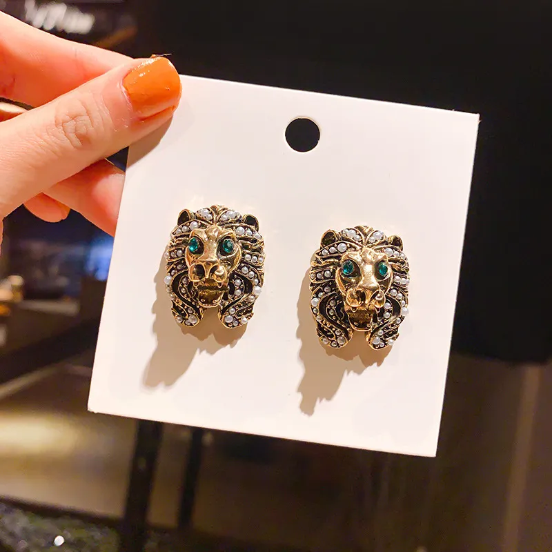 Charm Jewelry European and American retro Baroque lion head earrings female personality temperament metal texture pearl