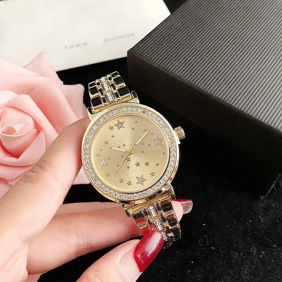 Montres de marque femmes dame fille cristal diamant étoile Style métal acier bande Quartz montre-bracelet avec Logo TOM 33