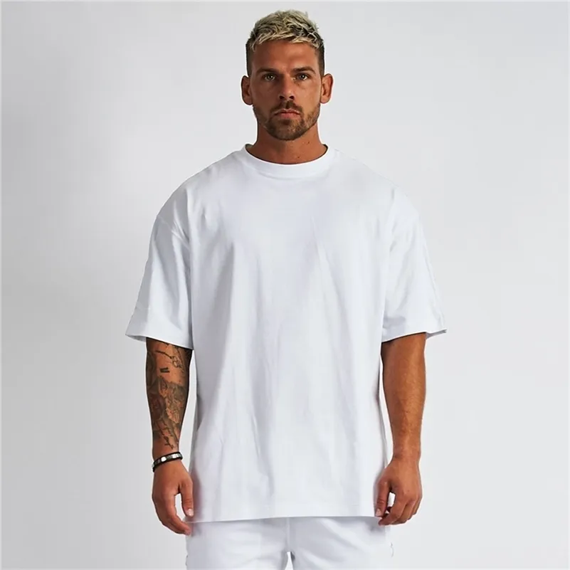 Solide surdimensionné T-shirt Hommes Bodybuilding et Fitness Tops Casual Lifestyle Gym Wear T-shirt Homme Loose Streetwear Hip-Hop Tshirt 210324