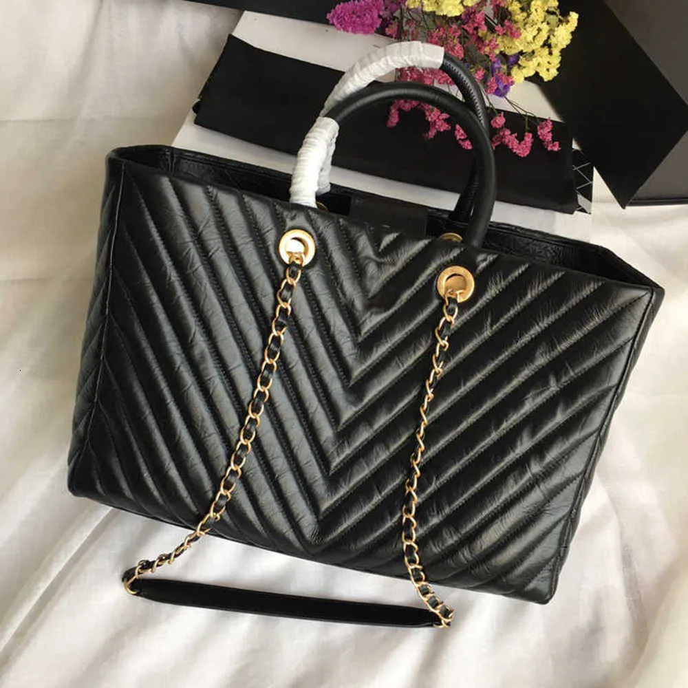 7H+Designers new style Large shoulder bags Imported palm print Gold metal fittings The inner cloth bag is equipped with layer fashion Handbag