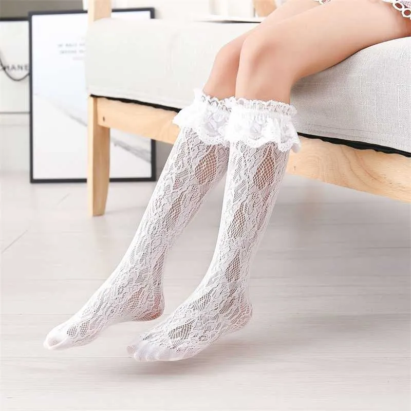 Calzini di pizzo bianco Donna Autunno Ita Lace Push Studenti Scava fuori Calze di seta tinta unita Calze a tubo centrale 211201