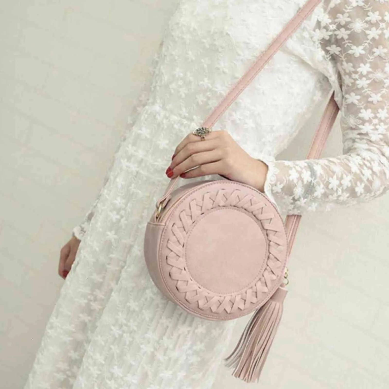 HBP Non- style version women's single shoulder solid color woven tassel small round bag fashion make-u