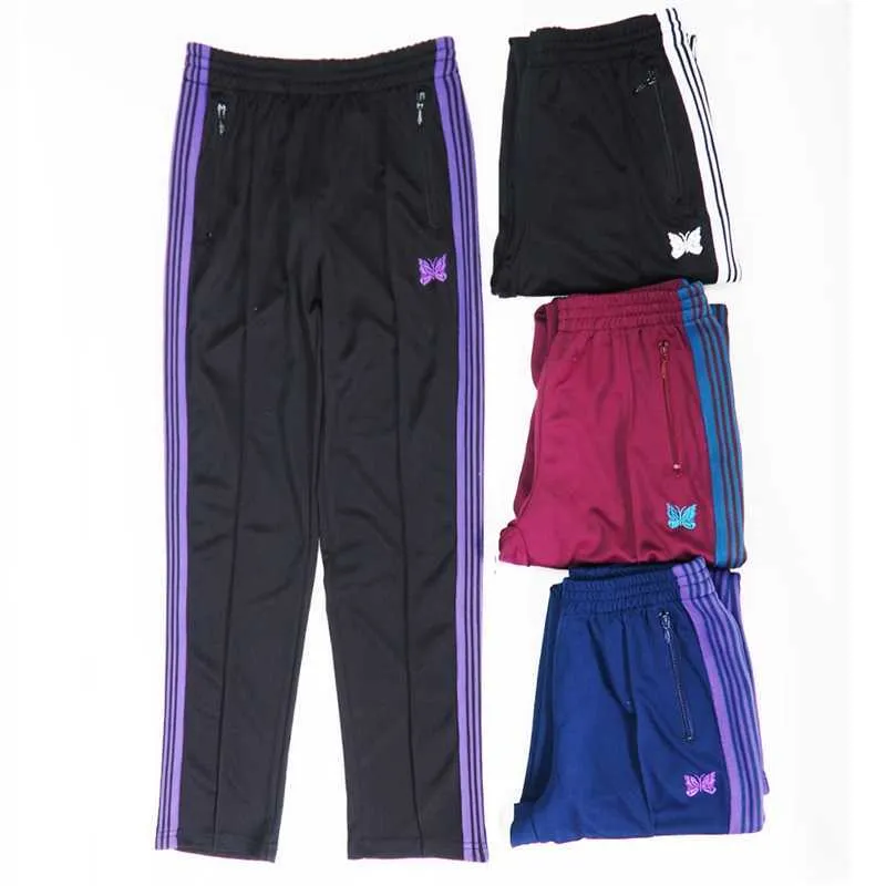 Trendy needles Butterfly Embroidery casual pants striped ribbon straight sports pants for men and women