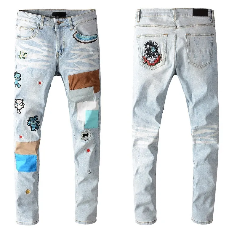 Mens jeans designer jean homem atacado marca patchwork proeminente legal personalizado rasgado angustiado buracos retro skate reto motocicleta motocicleta jeans calça
