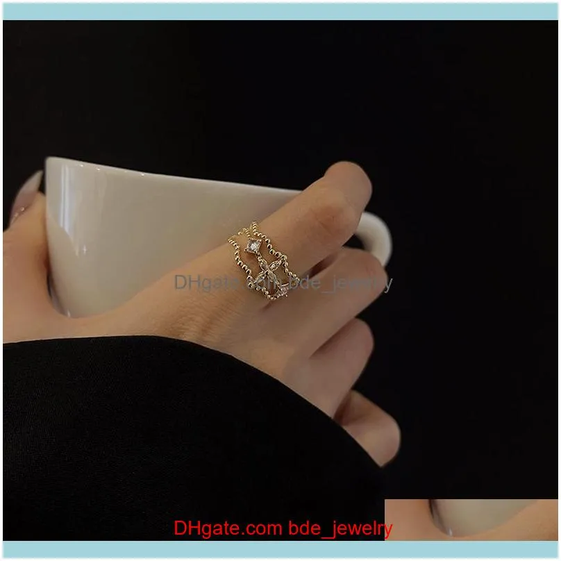 Bröllop SmyckenVedding Ringar Listing Smycken Äkta Koreansk Mode Geometrisk Flower Womens Enkel Hollow Dubbel Finger Zircon Ring för
