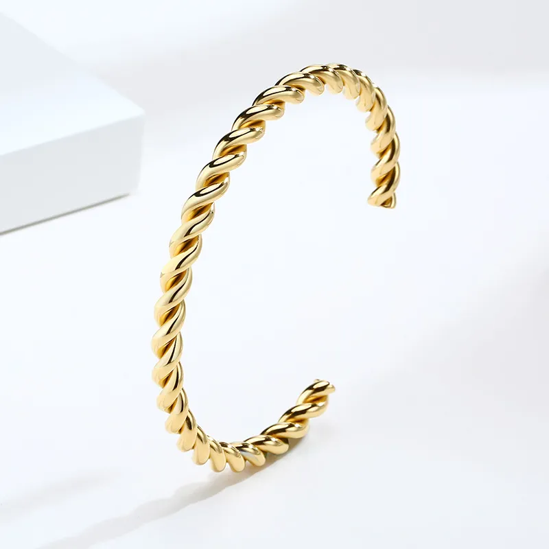 Bracciale rigido intrecciato Bracciale aperto 100% acciaio inossidabile Corda tono oro Bracciale intrecciato Gioielli da donna Stile minimalista