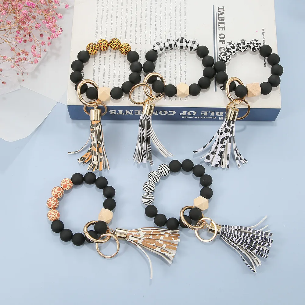 Drewniane koraliki Bransoletka Wristlet Leopard Drukuj kratę Bransoletka Biżuteria Tassel Key Party Favor Brelok Brelok Torby Wiszące Wisiorek Akcesoria Mody Bransoletki 07767-B